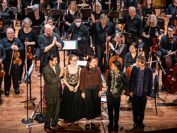 Santiago Beis, Leigha Amick, Jessie Leov, Paul Cosme and Steven Mackey receive applause from Christopher Rountree and the New Jersey Symphony after the 2024 Cone Institute Concert in Princeton