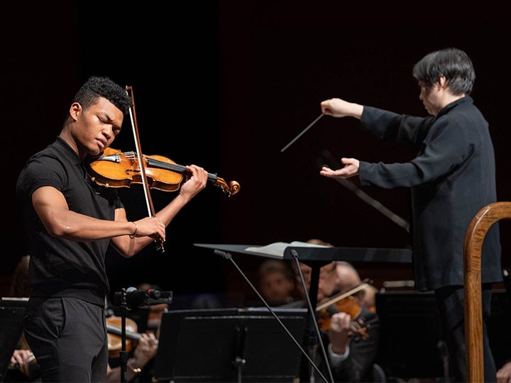 Xian Zhang conducting the New Jersey Symphony with Randall Goosby performing solo violin